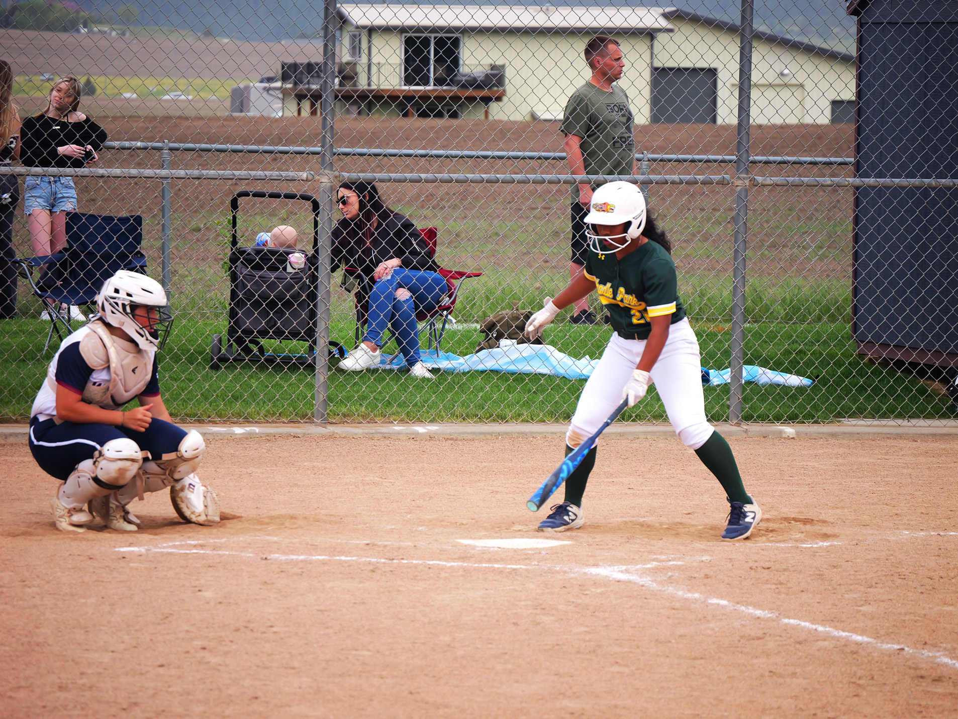 Fastpitch Softball Mt. Spokane Catcher and Shadle Park batter