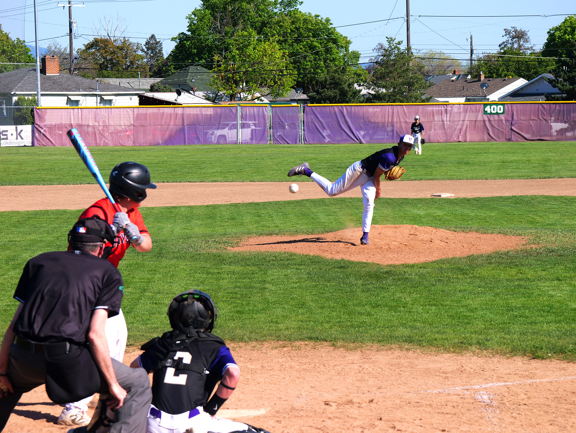 Rogers pitching to Clarkston
